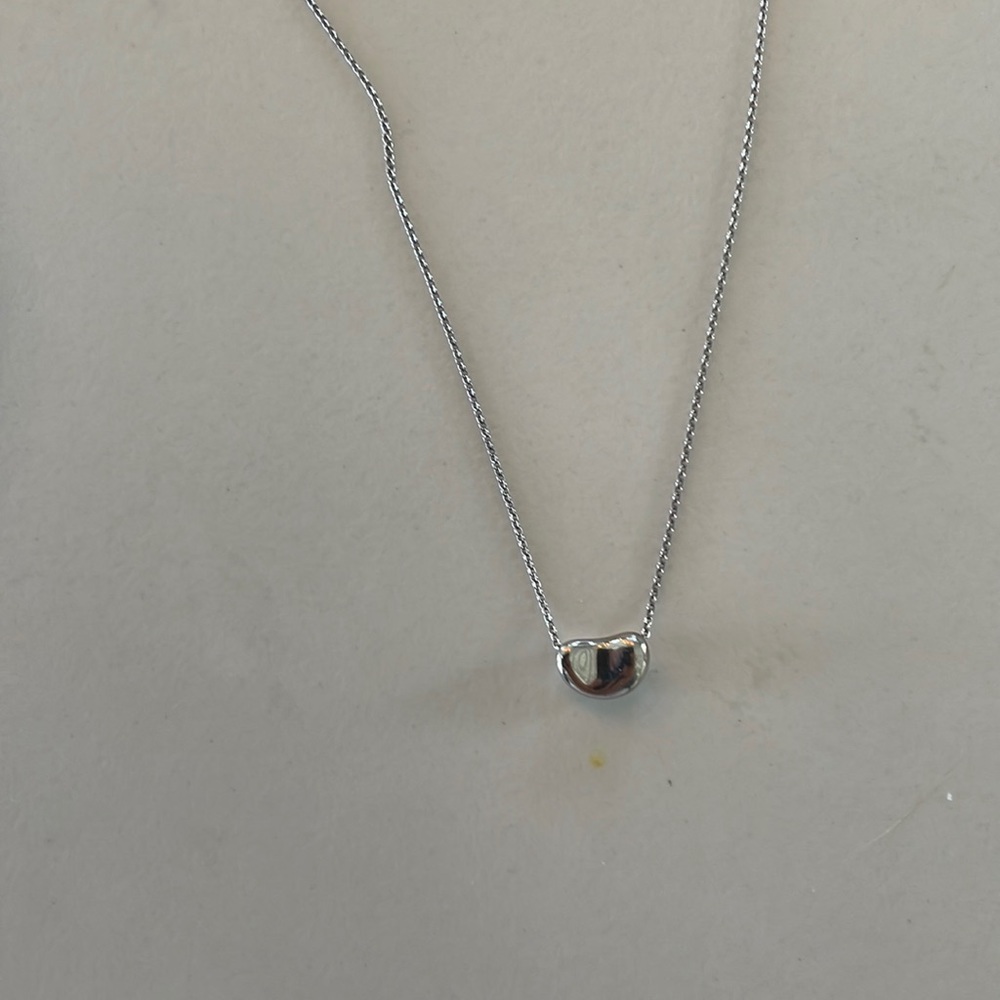 Tiffany’s and co Bean necklace.